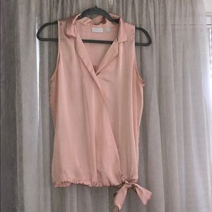 Pink blouse that ties on the bottom